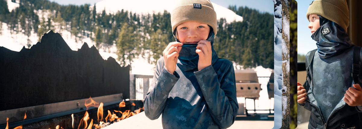 Kid Sitting by the fire in Blackstrap base layer crewneck